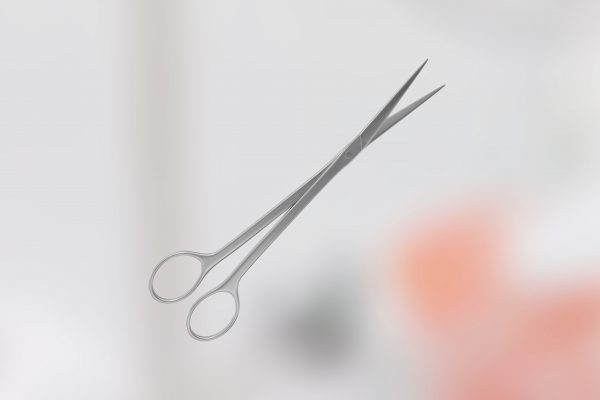 An illustrated scissors on a blurred background.