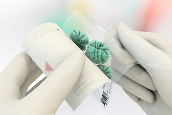 Two illustrated hands instructing how to open a Sorbact round swab package.